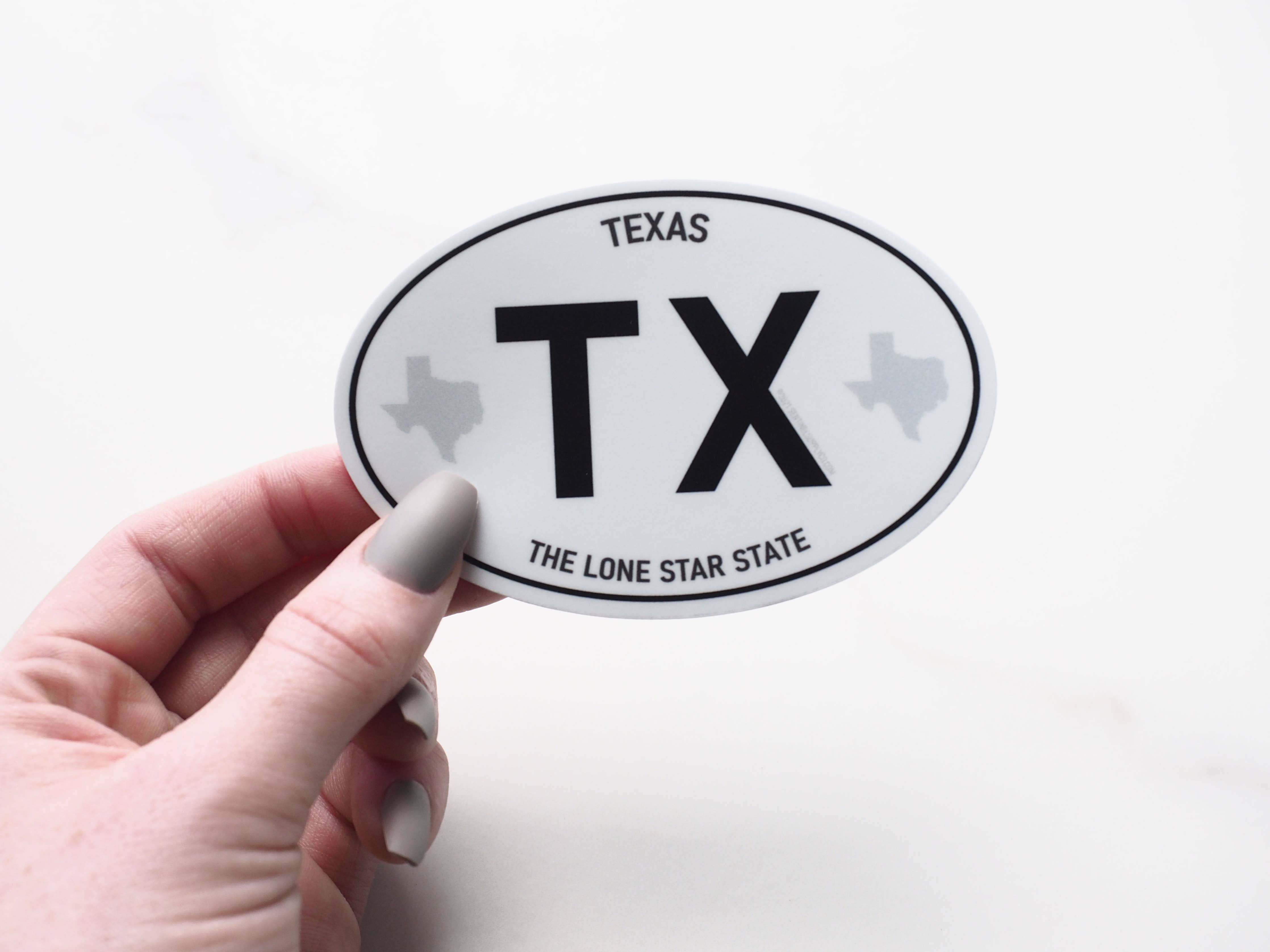 TX White Oval Euro Sticker