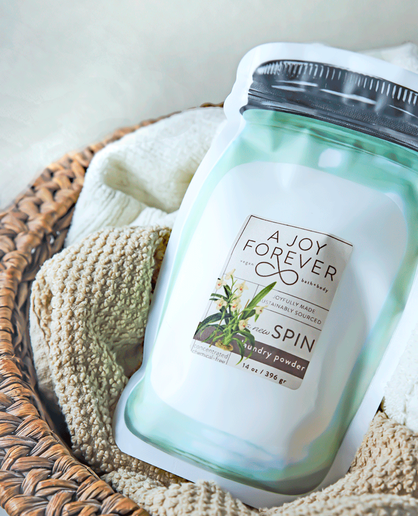 A Joy Forever Bath Body + Candles - A New Spin Biodegradable Laundry Powder: Lavender